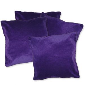 Image shows 4 plush, deep purple velvet cushions